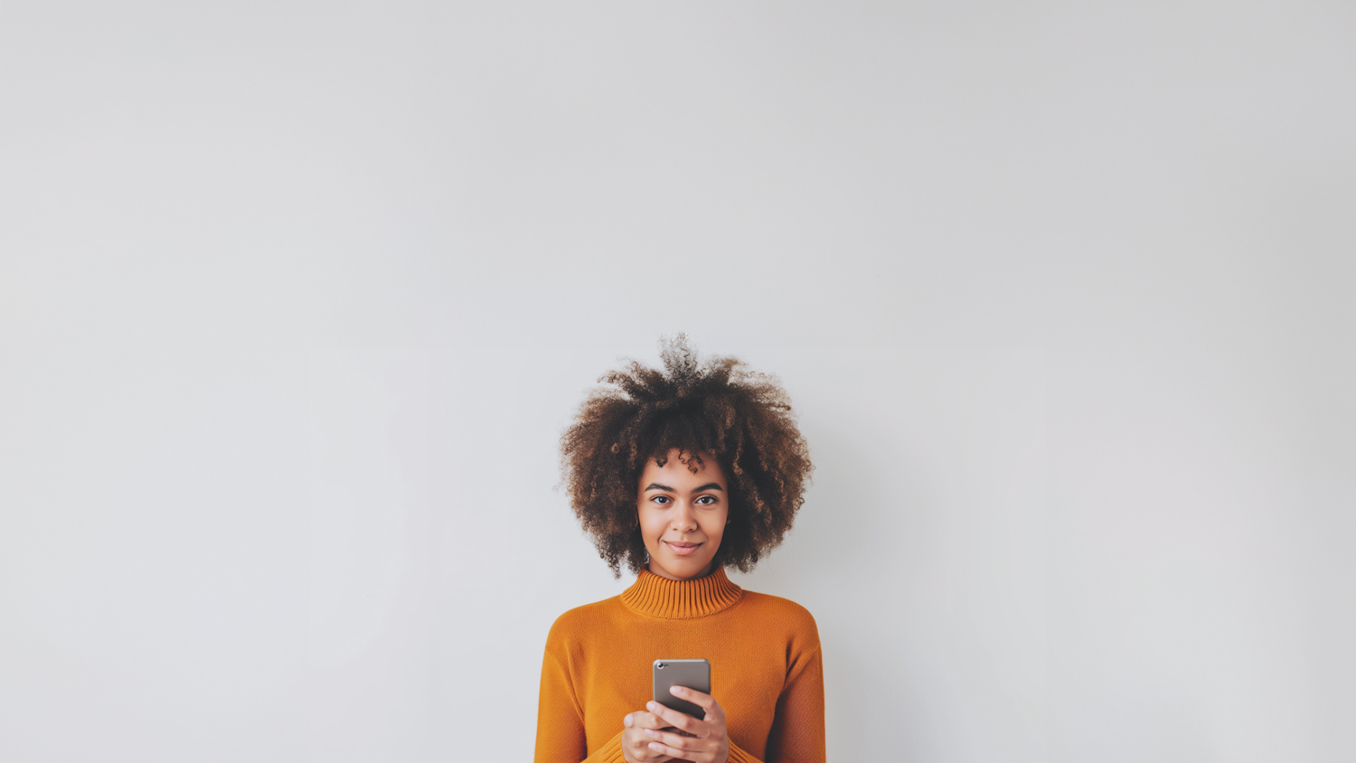 A creator recording a piece to camera on a smartphone